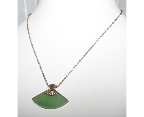 9ct gold green jade fan shaped pendant on a 9ct gold chain 