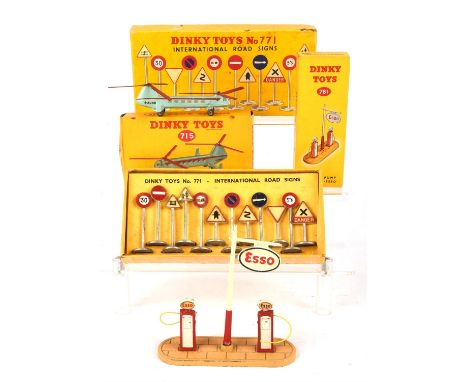 A dinky 771 International Road Sign set, a Dinky 781 Esso Petrol Pump Station and a Dinky 715 Bristol 173 Helicopter, all box