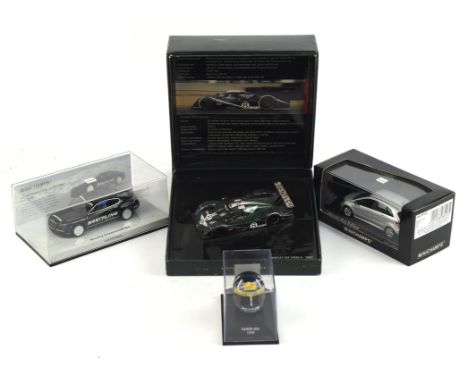 A Minichamps 1:43 scale Bentley EXP Speed 8 die-cast racing car, boxed, a Minichamps miniature F1 racing helmet titled Damon 