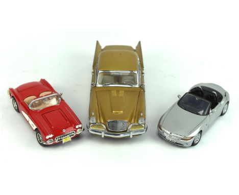 Twenty die-cast vehicles, 1:18 scale and smaller including  Burago, un-boxed.  (20)