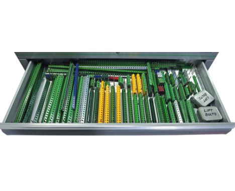 A vast collection of vintage Meccano and accessories including ; Electric motors, controllers, wheels, large cogs, circular f