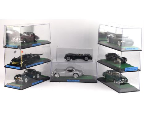 Eight 1:18 scale Jaguar die-cast cars comprising ; Signature 1949 XK 120 Racing, Motorbox 1988 XJR9LM, AUTOart D Type, Burago