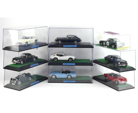 Nine 1:18 scale die-cast model cars comprising ; Road Signature 1947 MGTC Midget, AUTOart MGB GT Coupe, Revell MGA Roadster, 