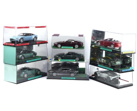 Nine 1:18 scale Aston Martin die-cast cars comprising ; Guiloy Aston Martin DB7, Maisto Aston Martin DB7 Vantage, Solido DB9 