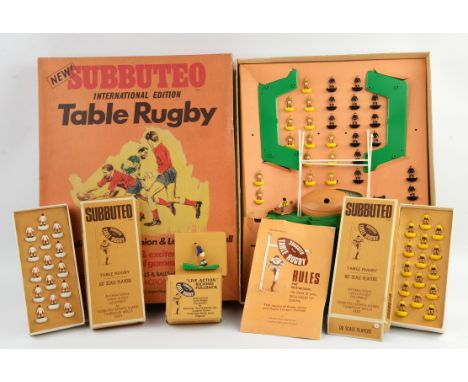 A Subbuteo 'International Edition' Table Rugby and two extra boxed teams, possibly England and Australia. (3)