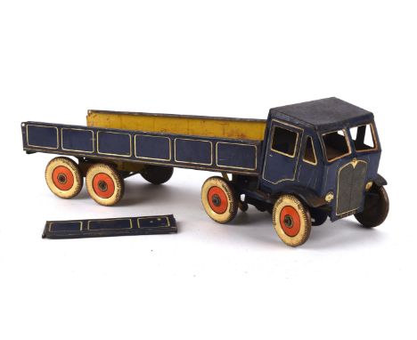 A Mettoy articulated open back lorry, dark blue cab, chassis and trailer, opening rear tail-gate, tinplate 'Dunlop Fort' ball