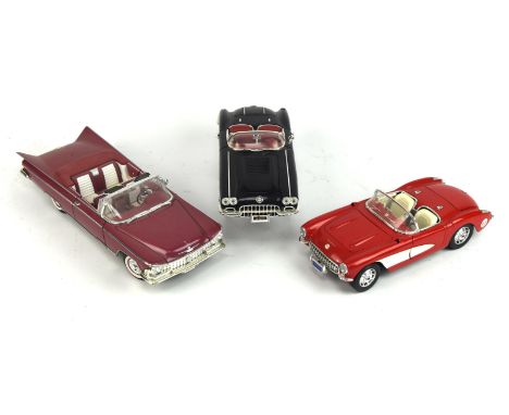 Twenty die-cast vehicles, 1:18 scale and smaller including  Burago, un-boxed.  (20)