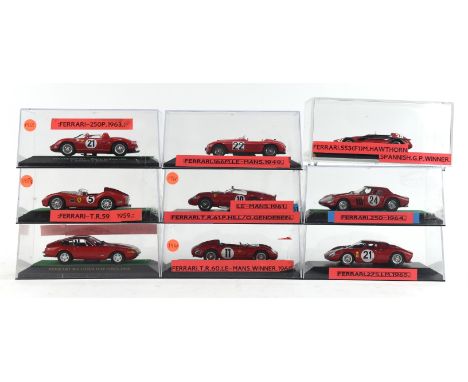 Thirty four 1:43 scale Ferrari die-cast racing cars including Brumm, each housed in a later Perspex case.  (34)