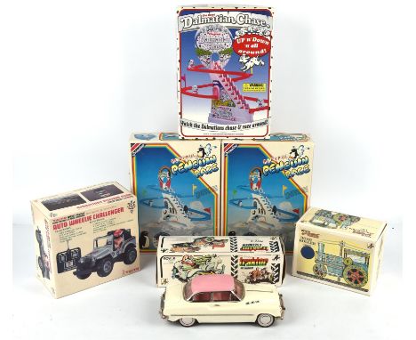 A Kovap Czechoslovakian tinplate steam roller, a Kovap tinplate Tractor and trailer, a Taiyo remote control car 'Auto Wheelie