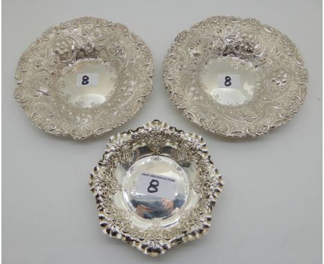 A lot comprising a pair of silver bon bon dishes, London 1895,15cm diameter and a single bon bon dish, Sheffield 1902, 11.5cm