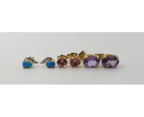 A pair of 14k gold ear studs set with pink gems, and two further pairs in yellow metal set with amethyst and turquoise, combi