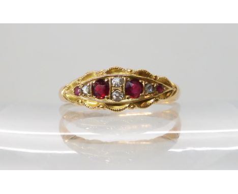 An 18ct gold ruby and diamond ring size T1/2, weight 3.1gms Condition Report: Available upon request