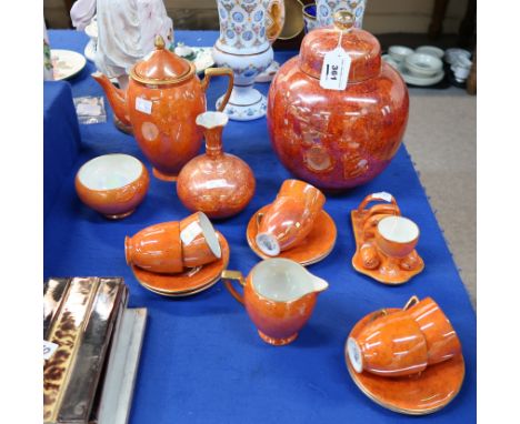 A Carlton Ware orange lustre coffee set, toastrack and condiments, a large ginger jar and a vase Condition Report: Coffee set