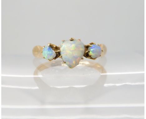 An 18ct gold heart shaped opal ring, size K1/2, weight 2.3gms Condition Report: Abrasions to the top of the heart, one of the