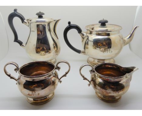 A four-piece silver tea service, London 1902, of baluster shape with gadrooned borders, each piece monogrammed "M", 1332gms C