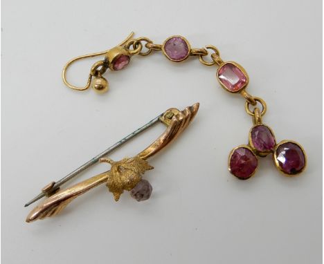 A 9ct gold amethyst thistle brooch (af) and a single yellow metal drop earring set with rubies, combined weight 3.2gms Condit