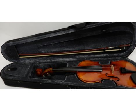 A Stagg violin, 35cm with bow 72cm and case Condition Report: Available upon request