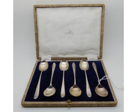 A cased set of six silver teaspoons, Sheffield marks, 109gms Condition Report: Available upon request