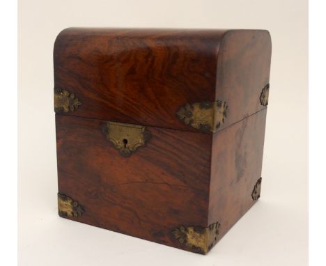 A rosewood and brass decanter bound four bottle decanter box with hinged shaped lip, with four decanters, 22cm wide x 26cm hi