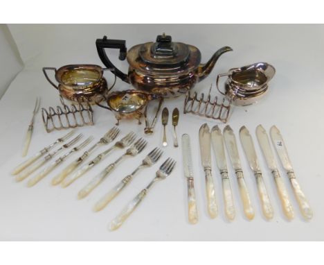 A tray lot of EP - tea service, toastracks, loose cutlery etc Condition Report: Available upon request