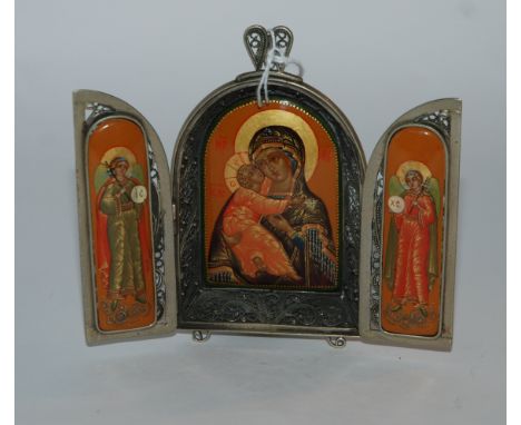 A white-metal and enamel triptych with filigree decoration, 11cm wide (open) x 9.5cm high with easel stand Condition Report: 