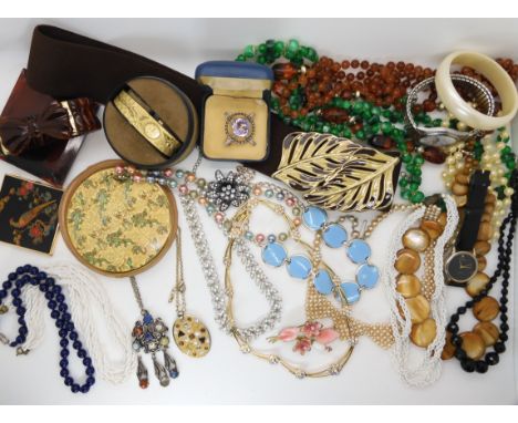 A Vogue vanities Dragon &amp; Phoenix compact, a silver and amethyst brooch and a collection of vintage costume jewellery Con