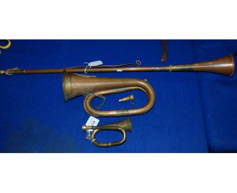 A brass hunting horn, Argyll &amp; Sutherland brass bugle and miniature bugle Condition Report: Available upon request