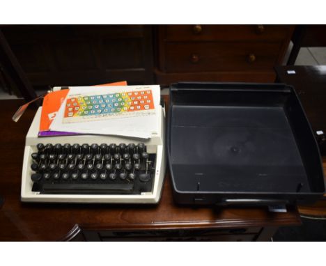 A vintage Adler Tippa typewriter in integral case