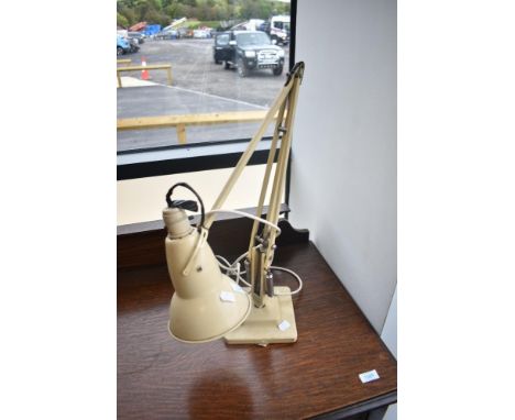 A vintage Herbert Terry angle poise lamp in cream