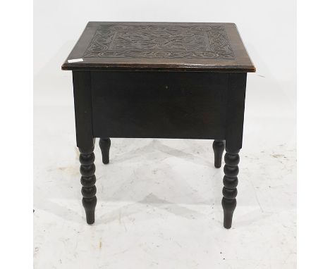 20th century oak lift-top box with carved top opening to reveal the interior, on bobbin turned supports, 47cm x 51cm, a coppe