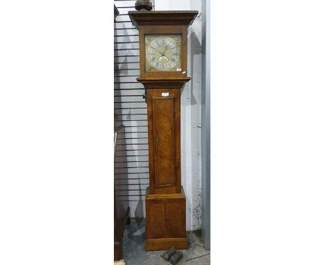 An early 18th century figured walnut longcase clock&nbsp;having ogee pediment, the brass dial with seconds and inscribed 'Ash