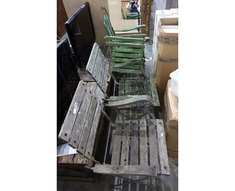 A vintage wrought iron and wooden garden chair, green painted, very rusty, two green painting folding vintage garden chairs a