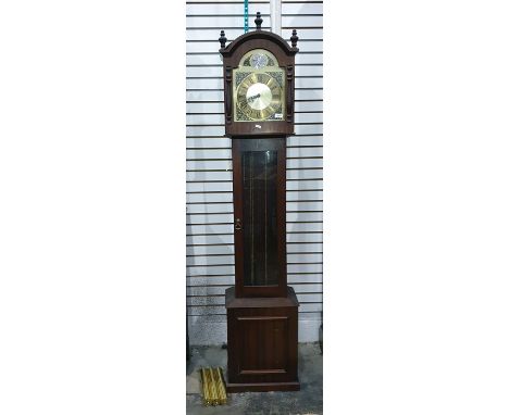 A 20th century mahogany cased longcase clock, the arched dial marked 'Tempus Fujit', Roman numerals to the brass chapter ring
