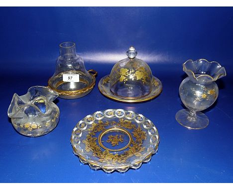 Gilt and clear covered butter dish with fruiting vine decoration, dome cover with pointed finial, cut glass gilt ormolu mount