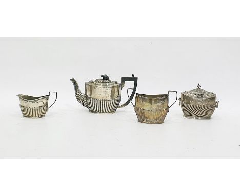 Edwardian silver three-piece tea service to include teapot, sugar bowl and a cream jug, all of half reeded design (Birmingham