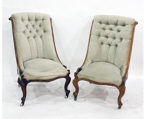 Pair of walnut framed salon chairs with button upholstered backs, serpentine front rails, on cabriole supports to castors (2)