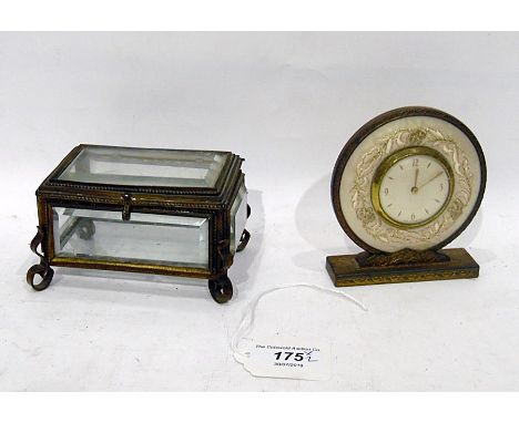 Gilt metal and cut glass small casket and a small dressing table clock with gilt metal having gilt embroidered fabric surroun