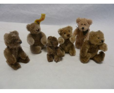 Steiff miniature teddy, seated 7cm high and five various jointed miniature gold plush teddies, various ages (6)