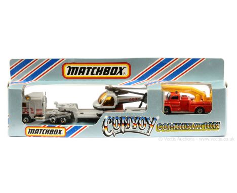 Matchbox Superfast Convoy Series rare combination twin pack containing CY11 Kenworth Articulated Helicopter Transporter - met