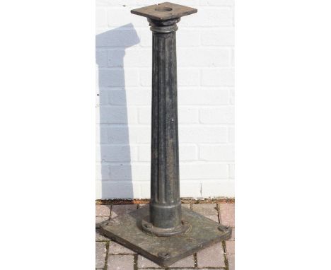 A large cast iron pillar or table base, approx 33cm W x 82cm H