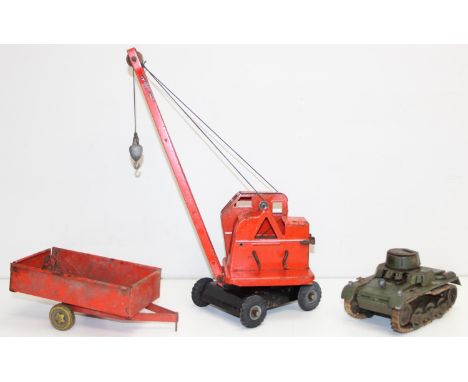 Vintage Triang KL44 Jones crane in red, trailer and a tin-plate army tank, tallest approx 45cm