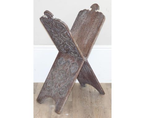 A carved and limed oak book stand of Celtic design, 20th century, 52cm x 28cm x 73cm when open