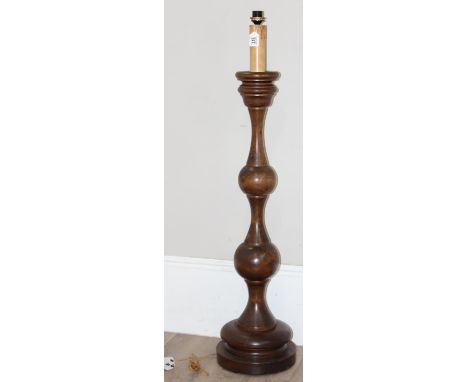 A large vintage turned wooden standard lamp with candle effect sconce, 142cm tall