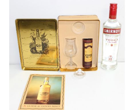 Glenmorangie 10 year old Single Highland Malt Scotch Whisky 5cl gift set in tin with glass, and a 70cl bottle of Smirnoff Vod