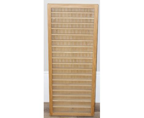 A modern light oak wall mounted display cabinet with removable glass or Perspex front, ideal for toy cars or Lego figures etc