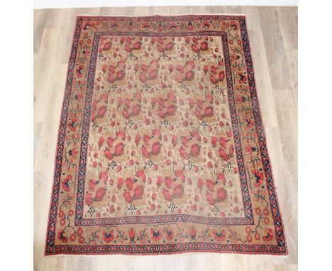 A good quality vintage rug of cream ground, believed to be Persian, 196cm x 142cm