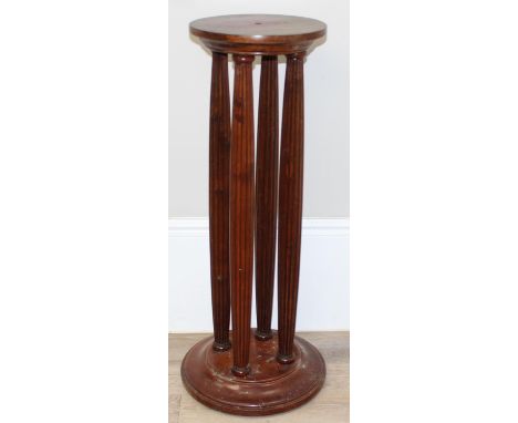 A Regency style jardinière stand with 4 reeded column pillar support, 20th century, 30cm in diameter x 92cm tall