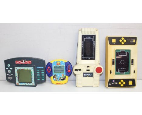 4 vintage/retro LCD handheld games to incl Galaxy Invader, Entex Electronics Soccer, Monopoly by Hasbro, and Toy Story