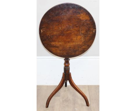 A Georgian mahogany tilt topped table on turned pillar with splayed 3 leg base, 50cm in diameter x 72cm tall