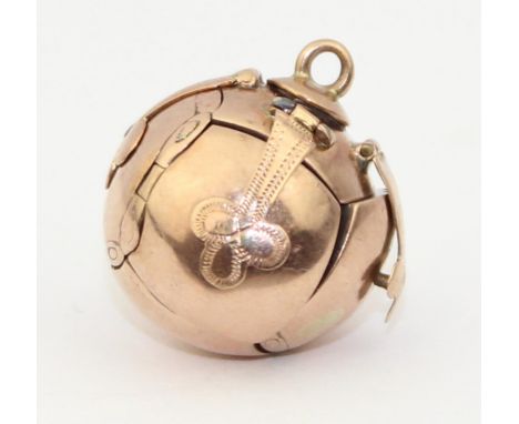 [6.61g] - a vintage 9ct gold and silver masonic orb or puzzle ball charm or fob, unmarked but the exterior testing as 9ct gol